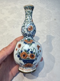Three polychrome Dutch Delft cashmere palette bottle vases, first quarter 18th C.