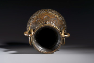 A fine and large Chinese archaistic gilt-bronze vase with handles, Ming