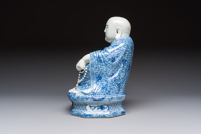 A fine Chinese blue and white Milefo Buddha on a wooden stand, Wei Hongtai Zao 魏洪泰造 mark, Republic