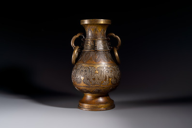A fine and large Chinese archaistic gilt-bronze vase with handles, Ming