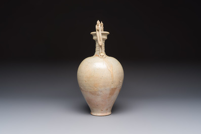 A Chinese straw-glazed pottery amphora with double dragon-shaped handles, Tang