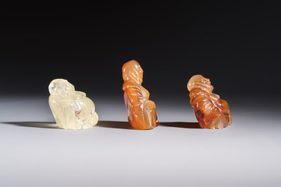 A Chinese carved rock crystal Milefo Buddha and two agate Milefo Buddhas, 19/20th C.