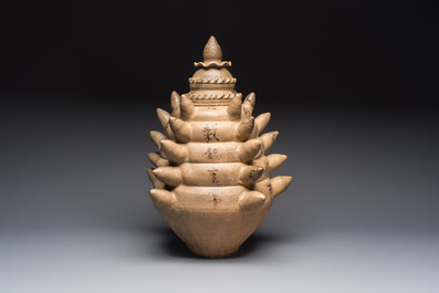 A large inscribed Chinese spiked funerary jar and cover, Northern Song, dated 1026