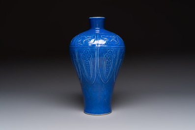 A Chinese archaistic blue-glazed vase with relief design, 20th C.