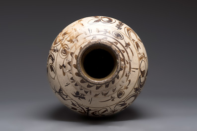 A large Chinese Cizhou ware slip-glazed wine jar, Ming