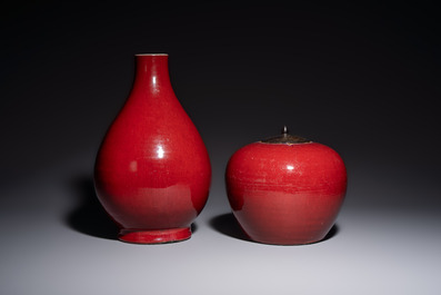 A Chinese flamb&eacute;-glazed vase and a jar with wooden cover, 19th C.