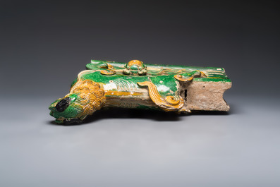 A large Chinese sancai-glazed pottery 'Buddhist Lion' roof tile, Ming