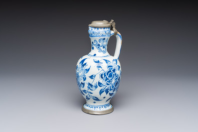 A blue and white pewter-mounted Delftware chinoiserie ewer, probably London, 17th C.