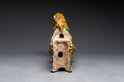 A large Chinese sancai-glazed pottery 'Buddhist Lion' roof tile, Ming
