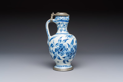A blue and white pewter-mounted Delftware chinoiserie ewer, probably London, 17th C.