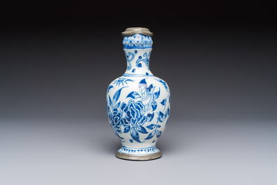 A blue and white pewter-mounted Delftware chinoiserie ewer, probably London, 17th C.