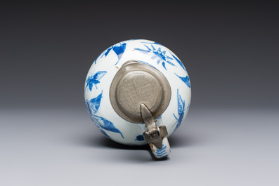A blue and white pewter-mounted Delftware chinoiserie ewer, probably London, 17th C.