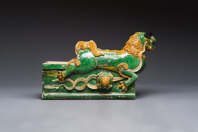 A large Chinese sancai-glazed pottery 'Buddhist Lion' roof tile, Ming