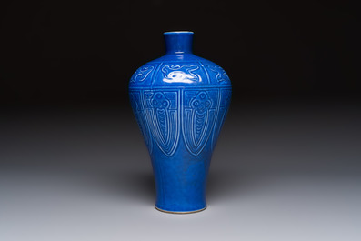 A Chinese archaistic blue-glazed vase with relief design, 20th C.