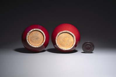 A Chinese flamb&eacute;-glazed vase and a jar with wooden cover, 19th C.