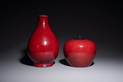 A Chinese flamb&eacute;-glazed vase and a jar with wooden cover, 19th C.