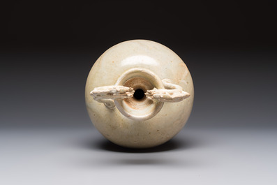 A Chinese straw-glazed pottery amphora with double dragon-shaped handles, Tang