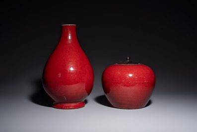 A Chinese flamb&eacute;-glazed vase and a jar with wooden cover, 19th C.