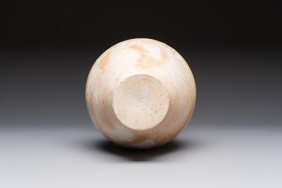 A Chinese straw-glazed pottery amphora with double dragon-shaped handles, Tang