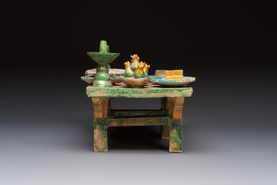 A Chinese sancai-glazed pottery model of an offering table, Ming