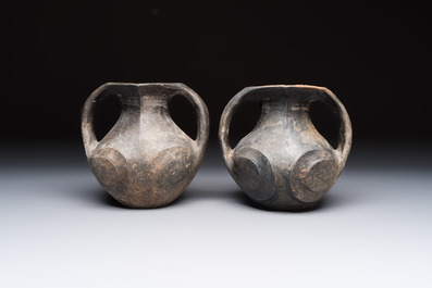 Two Chinese Sichuan black burnished pottery amphoras, Han