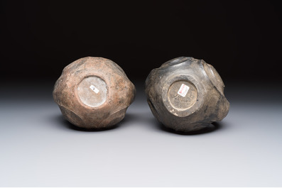 Two Chinese Sichuan black burnished pottery amphoras, Han