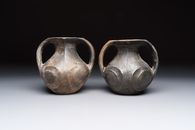 Two Chinese Sichuan black burnished pottery amphoras, Han