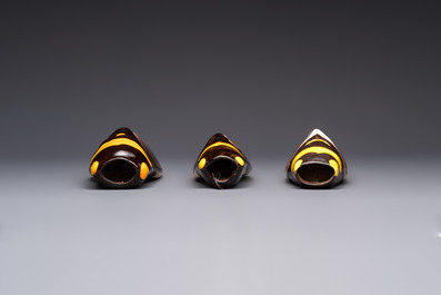 A collection of 19 French &lsquo;Cicada&rsquo; wall pocket vases, 20th C.