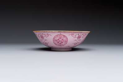 Three Chinese famille rose pink-ground bowls with floral design, Qianlong mark and of the period