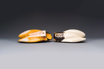 A collection of 19 French &lsquo;Cicada&rsquo; wall pocket vases, 20th C.