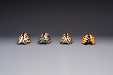 A collection of 19 French &lsquo;Cicada&rsquo; wall pocket vases, 20th C.