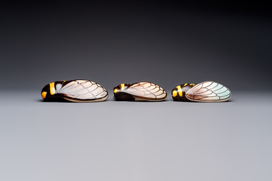 A collection of 19 French &lsquo;Cicada&rsquo; wall pocket vases, 20th C.