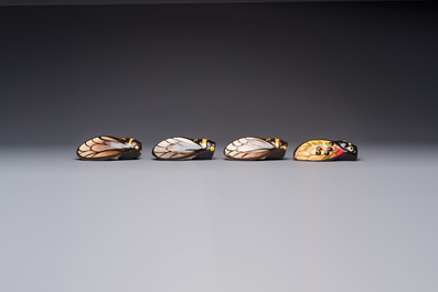 A collection of 19 French &lsquo;Cicada&rsquo; wall pocket vases, 20th C.