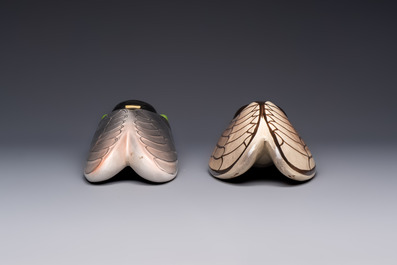 A collection of 19 French &lsquo;Cicada&rsquo; wall pocket vases, 20th C.