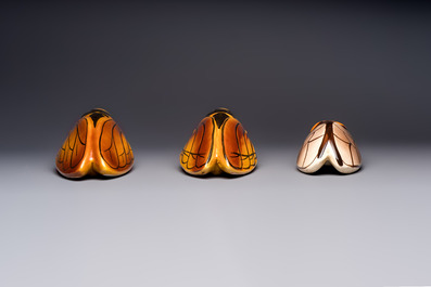 A collection of 19 French &lsquo;Cicada&rsquo; wall pocket vases, 20th C.