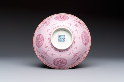 Three Chinese famille rose pink-ground bowls with floral design, Qianlong mark and of the period