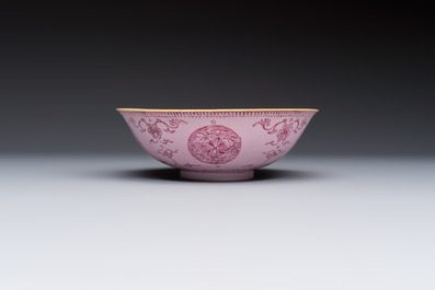 Three Chinese famille rose pink-ground bowls with floral design, Qianlong mark and of the period