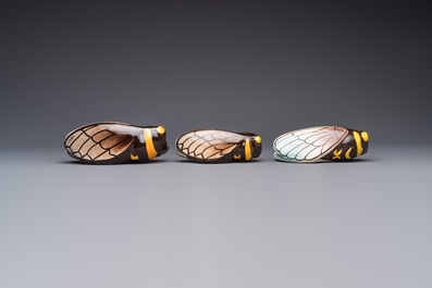 A collection of 19 French &lsquo;Cicada&rsquo; wall pocket vases, 20th C.
