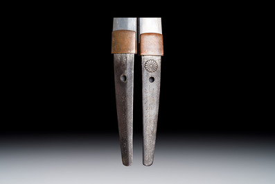 A Japanese katana, signed Yamashiro no Kami Fujiwara Kunikiyo, inscribed 'forged from Nanban tetsu' and chrysanthemum crest, with koshirae, ca. 1629-1665