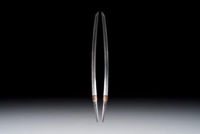 A Japanese katana, signed Yamashiro no Kami Fujiwara Kunikiyo, inscribed 'forged from Nanban tetsu' and chrysanthemum crest, with koshirae, ca. 1629-1665