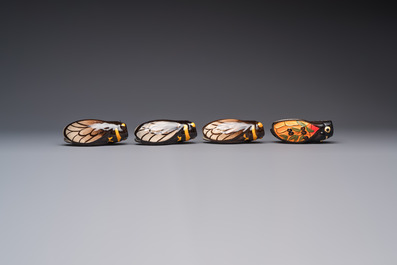 A collection of 19 French &lsquo;Cicada&rsquo; wall pocket vases, 20th C.