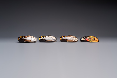 A collection of 19 French &lsquo;Cicada&rsquo; wall pocket vases, 20th C.