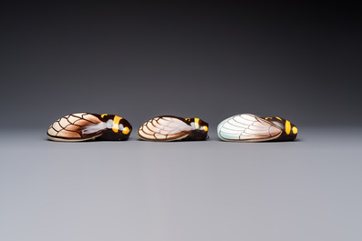 A collection of 19 French &lsquo;Cicada&rsquo; wall pocket vases, 20th C.