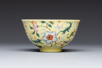 A Chinese famille rose sgraffito lemon-yellow-ground 'Flower Scrolls' bowl, Qianlong mark, 20th C.