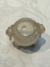 A group of ten Chinese hardstone and cherry amber carvings, 20th C.