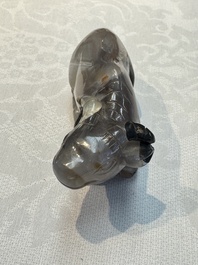 A group of ten Chinese hardstone and cherry amber carvings, 20th C.