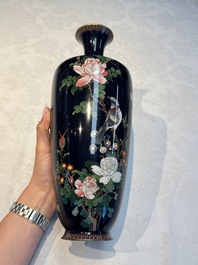 A pair of Japanese silver-wired cloisonn&eacute; enamel vases with birds among flowering branches, Meiji period, 19th C.
