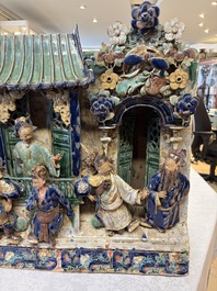 A large and fine Chinese polychrome-glazed Shiwan stoneware group of immortals, 19th C.