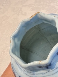 A blue and white Dutch Delft covered vase and two polychrome plates, 17/18th C.