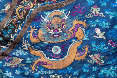 A Chinese blue-ground embroidered silk 'Dragon' robe, 'Ji Fu' 吉服, 19th C.